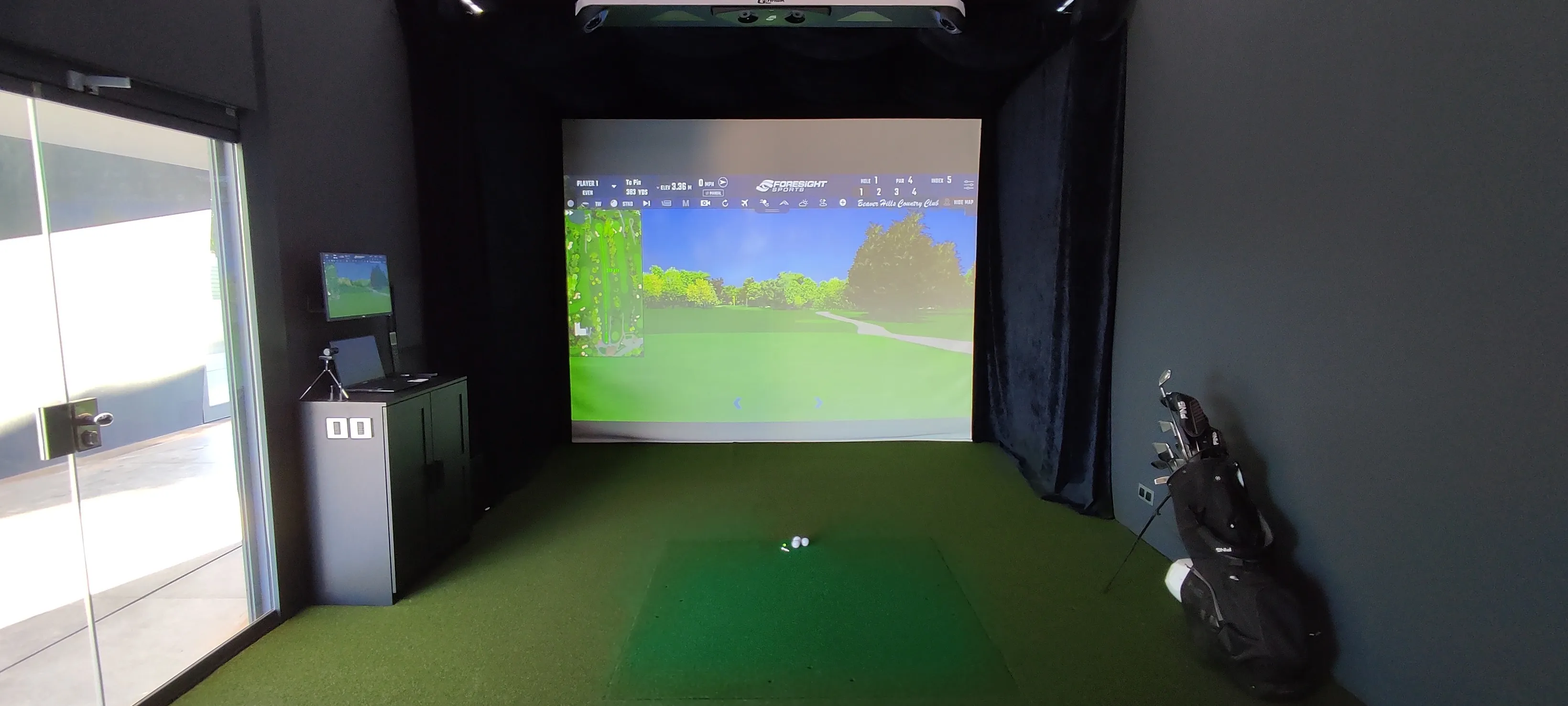 Indoor golf simulator room